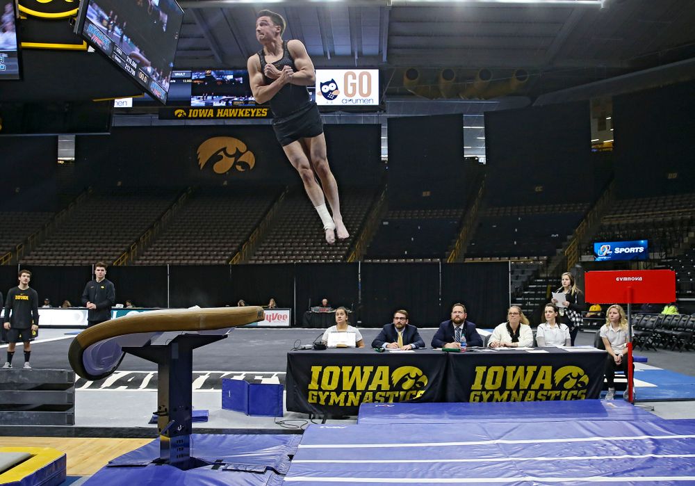 Iowa's Jake Brodarzon competes in the vault against Ohio State at Caver-Hawkeye Arena in Iowa City on Saturday, Mar. 16, 2019. (Stephen Mally for HawkeyeSports.com)