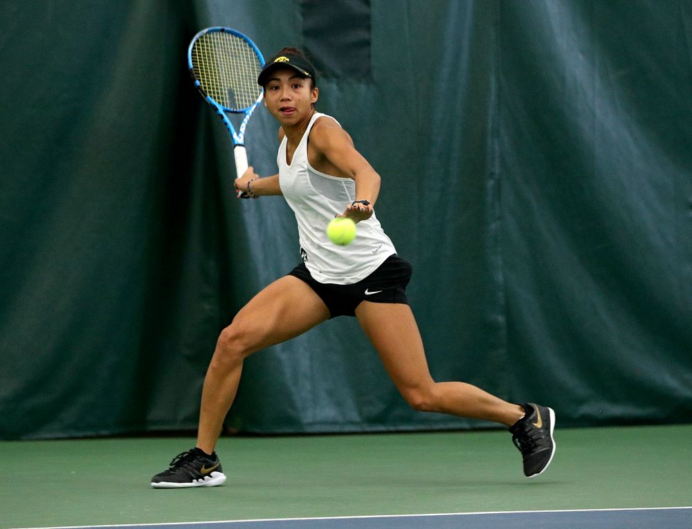 Iowa’s Michelle Bacalla returns a shot during her singles match at the Hawkeye Tennis and Recreation Complex in Iowa City on Sunday, February 23, 2020. (Stephen Mally/hawkeyesports.com)