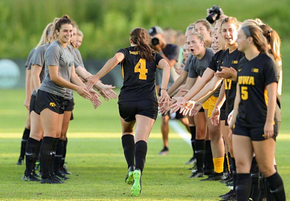 Iowa forward Kaleigh Haus (4) is introduced before the start of their match against Western Michigan at the Iowa Soccer Complex in Iowa City on Thursday, Aug 22, 2019. (Stephen Mally/hawkeyesports.com)
