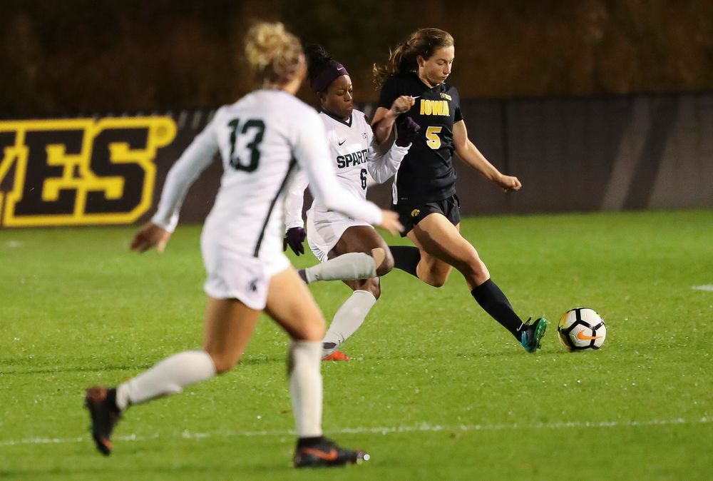 Iowa Hawkeyes defender Riley Whitaker (5) dribbles the ball during a game against Michigan State at the Iowa Soccer Complex on October 12, 2018. (Tork Mason/hawkeyesports.com)