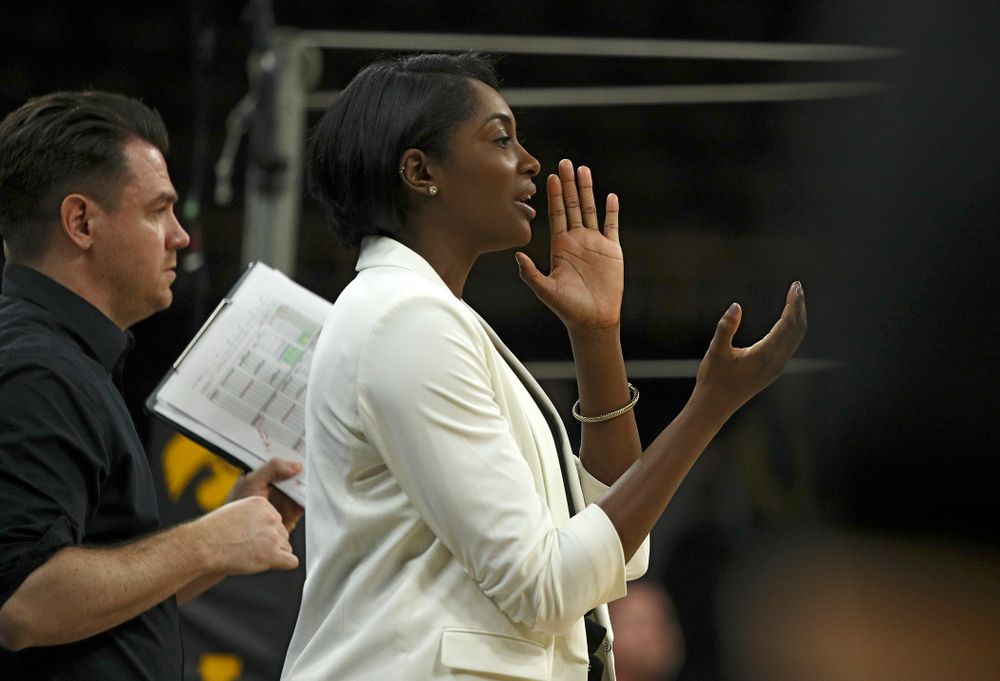 Iowa head coach Vicki Brown (right) shouts to her team as assistant coach Bobby Hughes looks on during the fourth set of their match at Carver-Hawkeye Arena in Iowa City on Saturday, Nov 30, 2019. (Stephen Mally/hawkeyesports.com)