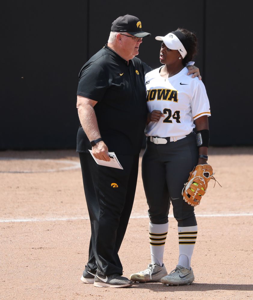 Iowa Hawkeyes DoniRae Mayhew (24) and assistant coach Rick Dillinger against the Ohio State Buckeyes on senior day Sunday, May 5, 2019 at Pearl Field. (Brian Ray/hawkeyesports.com)