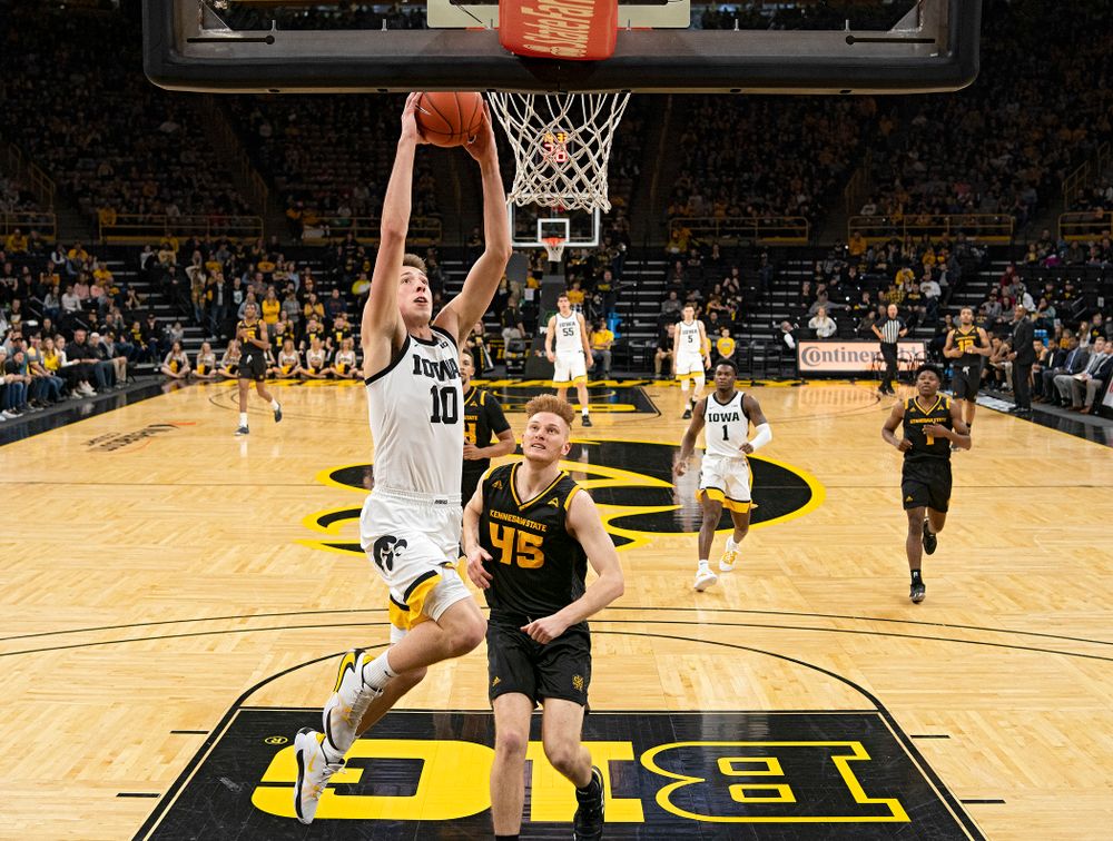 Iowa Hawkeyes guard Joe Wieskamp (10) dunks the ball during the second half of their their game at Carver-Hawkeye Arena in Iowa City on Sunday, December 29, 2019. (Stephen Mally/hawkeyesports.com)