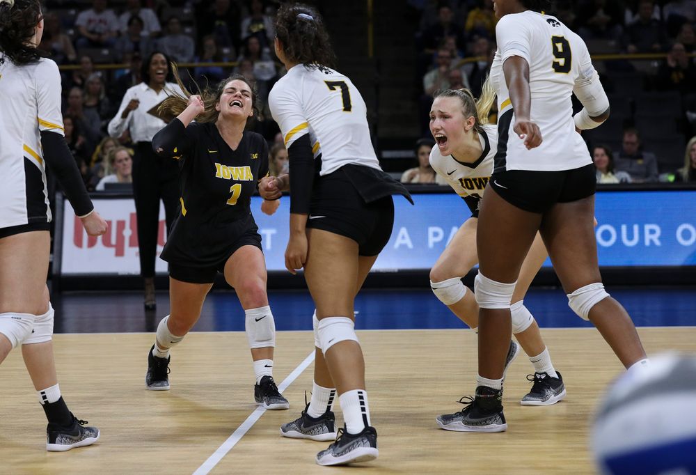 Iowa Hawkeyes defensive specialist Molly Kelly (1) and Iowa Hawkeyes outside hitter Cali Hoye (14) celebrate after winning a point during a match against Penn State at Carver-Hawkeye Arena on November 3, 2018. (Tork Mason/hawkeyesports.com)