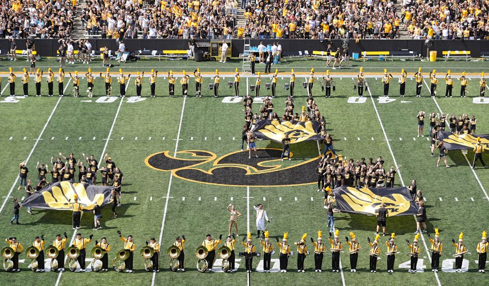 The Hawkeye Marching Band on the field as Pat Green performs “Wave on Wave” during the second quarter of their Big Ten Conference football game at Kinnick Stadium in Iowa City on Saturday, Sep 7, 2019. (Stephen Mally/hawkeyesports.com)