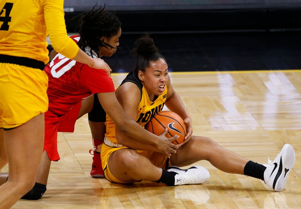 Iowa Hawkeyes guard Alexis Sevillian (5) corralls a loose ball during a game against the Ohio State Buckeyes at Carver-Hawkeye Arena on January 25, 2018. (Tork Mason/hawkeyesports.com)