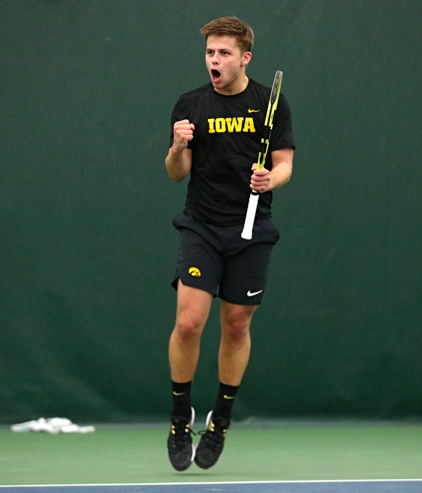Iowa’s Will Davies celebrates after winning his singles match at the Hawkeye Tennis and Recreation Complex in Iowa City on Friday, March 6, 2020. (Stephen Mally/hawkeyesports.com)