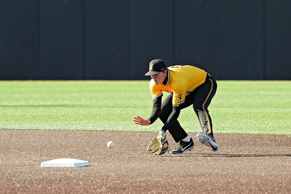 Iowa Hawkeyes shortstop Brendan Sher (2) fields a ground ball before stepping on second base while turning a double play during the third inning of their game at Duane Banks Field in Iowa City on Tuesday, Apr. 2, 2019. (Stephen Mally/hawkeyesports.com)
