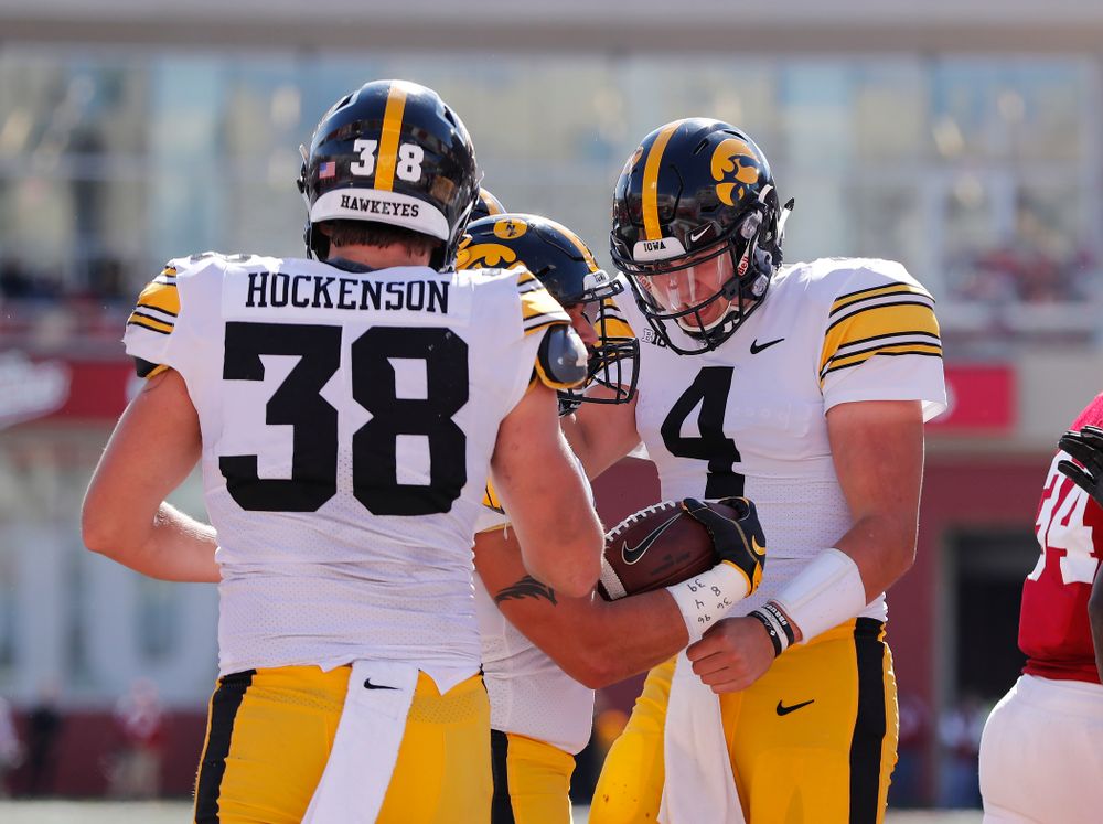 Iowa Hawkeyes fullback Austin Kelly celebrates with quarterback Nate Stanley (4) after scoring  against the Indiana Hoosiers Saturday, October 13, 2018 at Memorial Stadium, in Bloomington, Ind. (Brian Ray/hawkeyesports.com)