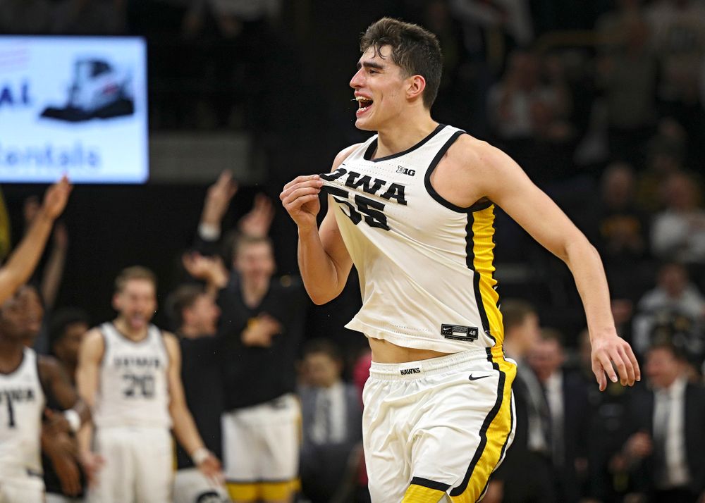 Iowa Hawkeyes center Luka Garza (55) celebrates after a score during the second half of the game at Carver-Hawkeye Arena in Iowa City on Sunday, February 2, 2020. (Stephen Mally/hawkeyesports.com)