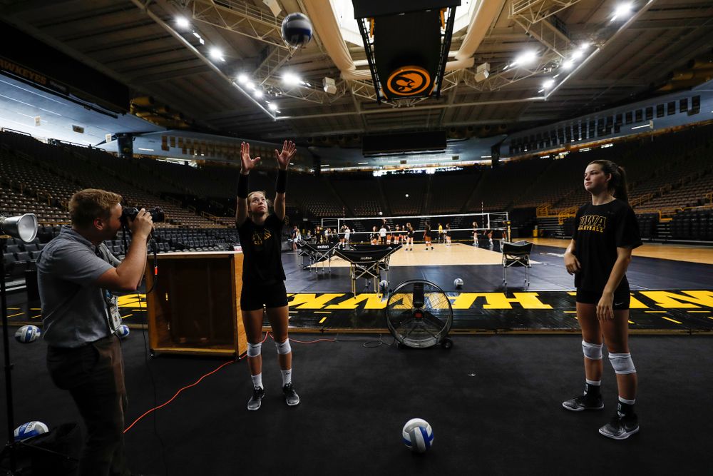 Iowa Hawkeyes outside hitter Meghan Buzzerio (5) and setter Courtney Buzzerio (2) during the team's annual media day Friday, August 17, 2018 at Carver-Hawkye Arena. (Brian Ray/hawkeyesports.com)