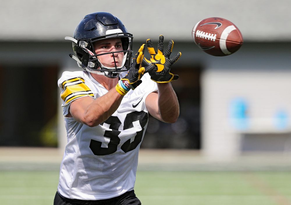 Iowa Hawkeyes defensive back Riley Moss (33) pulls in a pass as they run a drill during Fall Camp Practice No. 13 at the Hansen Football Performance Center in Iowa City on Friday, Aug 16, 2019. (Stephen Mally/hawkeyesports.com)
