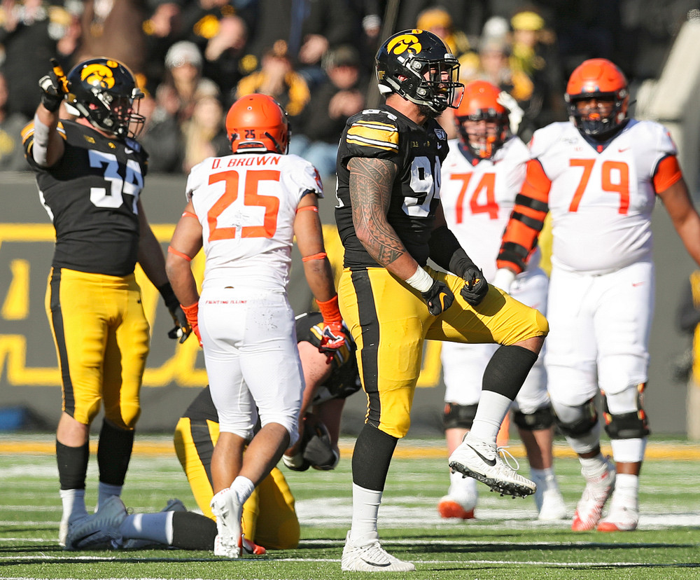 Iowa Hawkeyes defensive end A.J. Epenesa (94) celebrates a tackle during the third quarter of their game at Kinnick Stadium in Iowa City on Saturday, Nov 23, 2019. (Stephen Mally/hawkeyesports.com)