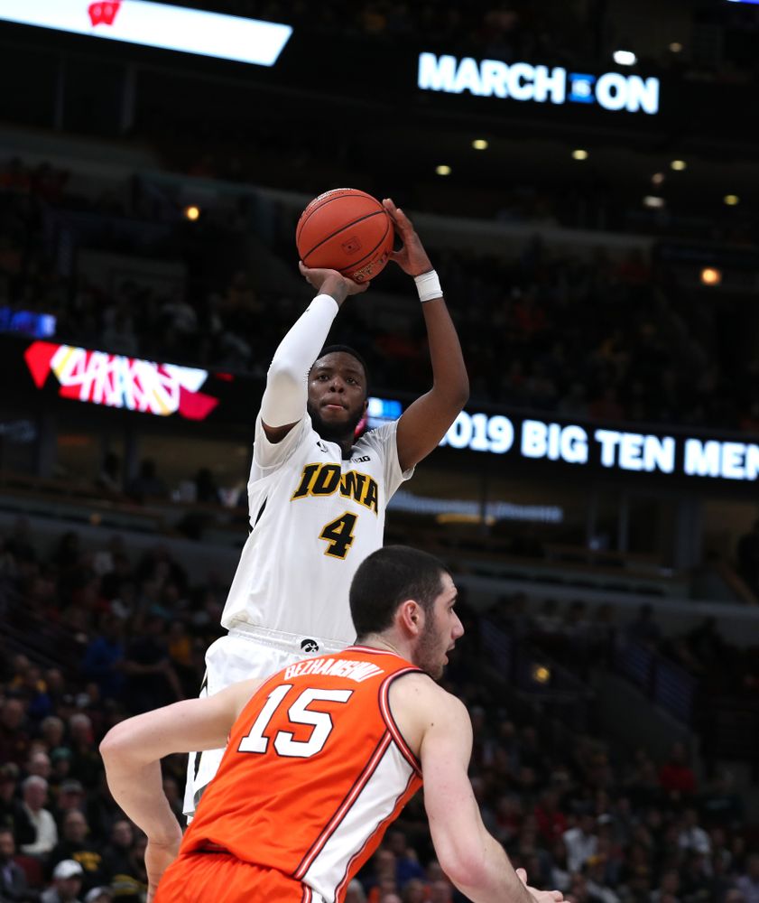 Iowa Hawkeyes guard Isaiah Moss (4) against the Illinois Fighting Illini in the 2019 Big Ten Men's Basketball Tournament Thursday, March 14, 2019 at the United Center in Chicago. (Brian Ray/hawkeyesports.com)