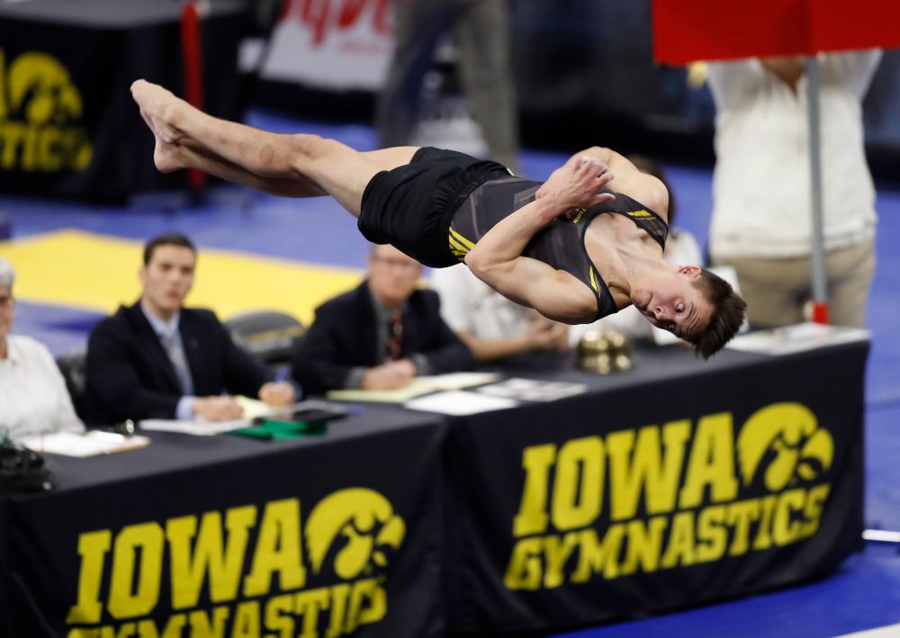 Iowa's Kulani Taylor competes on the floor 