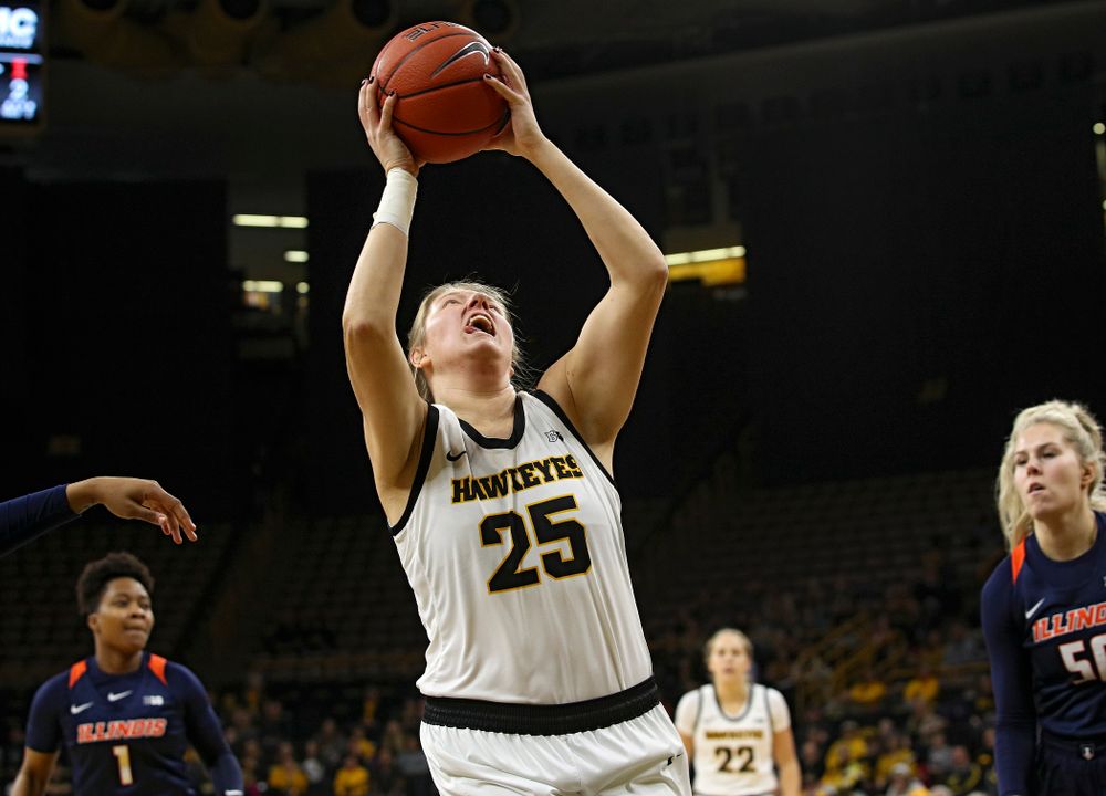 Iowa Hawkeyes forward Monika Czinano (25) scores a basket inside during the first quarter of their game at Carver-Hawkeye Arena in Iowa City on Tuesday, December 31, 2019. (Stephen Mally/hawkeyesports.com)