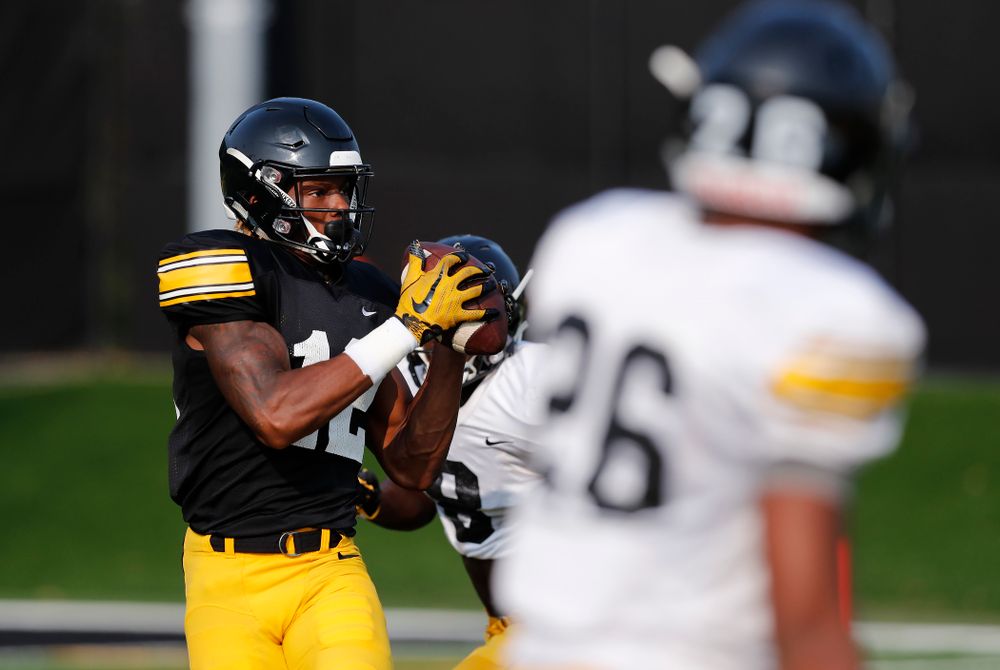Iowa Hawkeyes wide receiver Brandon Smith (12) during camp practice No. 16 Tuesday, August 21, 2018 at the Hansen Football Performance Center. (Brian Ray/hawkeyesports.com)