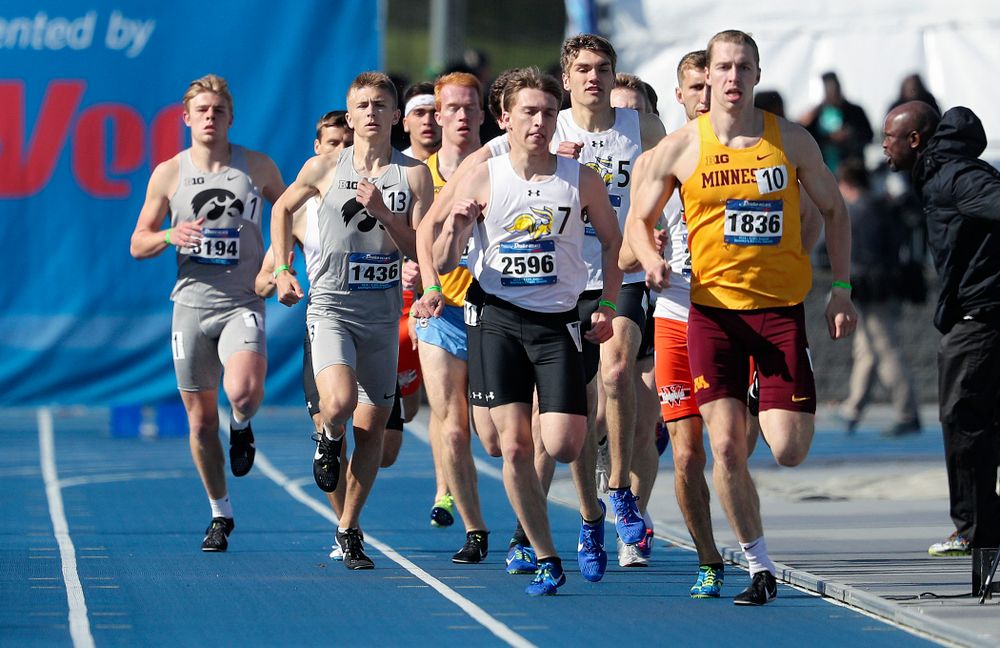 Iowa's Josh Andrews (from left) and Tyler Olson run the men's 800 meter event during the first day of the Drake Relays at Drake Stadium in Des Moines on Thursday, Apr. 25, 2019. (Stephen Mally/hawkeyesports.com)
