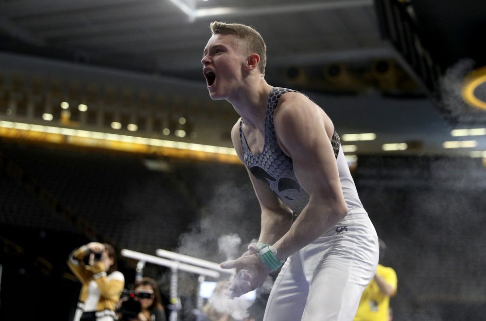 Iowa’s Carter Tope competes on the high bar against UIC and Minnesota Saturday, February 1, 2020 at Carver-Hawkeye Arena. (Brian Ray/hawkeyesports.com)