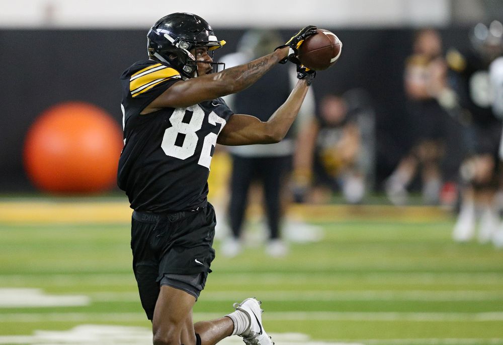 Iowa Hawkeyes wide receiver Calvin Lockett (82) pulls in a pass during Fall Camp Practice No. 9 at the Hansen Football Performance Center in Iowa City on Monday, Aug 12, 2019. (Stephen Mally/hawkeyesports.com)