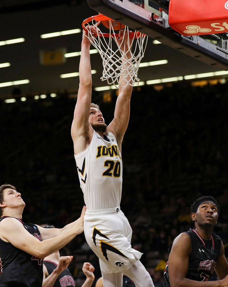 Iowa Hawkeyes forward Riley Till (20) goes up for a dunk during a game against Guilford College at Carver-Hawkeye Arena on November 4, 2018. (Tork Mason/hawkeyesports.com)