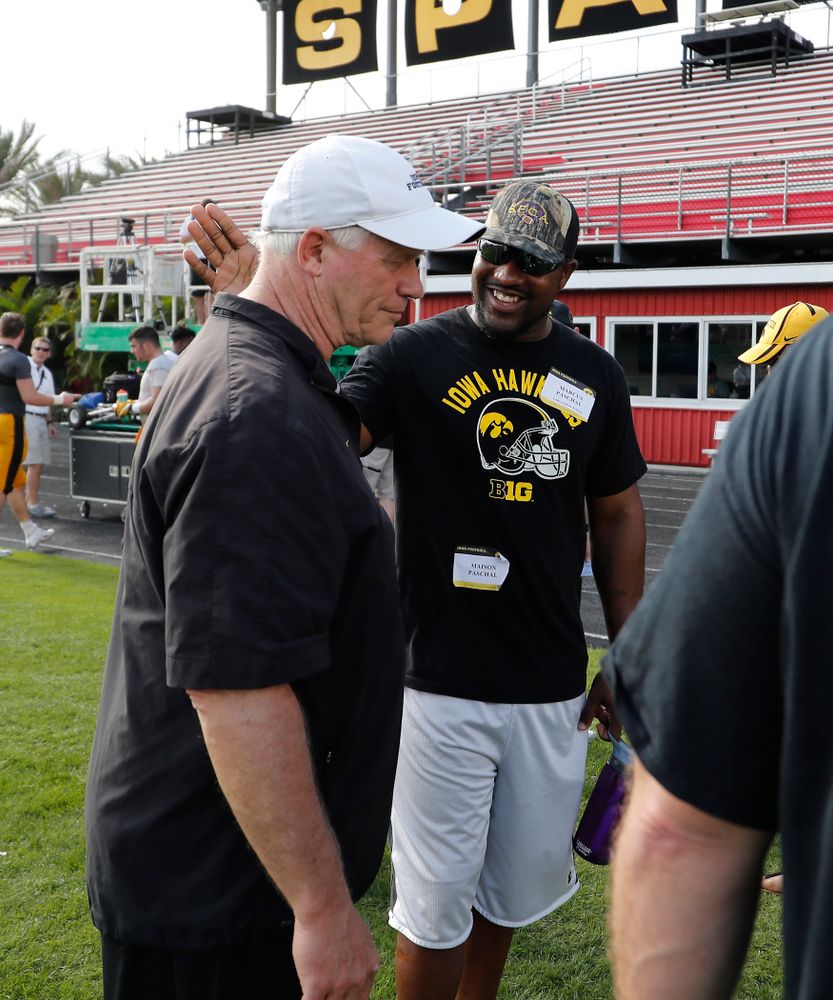 Iowa Hawkeyes defensive line coach Reese Morgan talks with former Hawkeye Marcus Paschal during Outback Bowl practice Thursday, Dec. 29, 2016 at Tampa University. (Brian Ray/hawkeyesports.com)