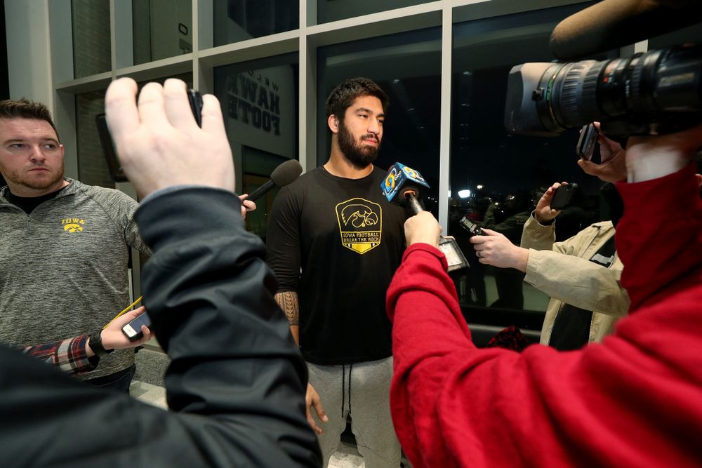Iowa Hawkeyes defensive end A.J. Epenesa (94) answers questions from the media on the Hawkeyes selection to face USC in the 2019 Holiday Bowl Sunday, December 8, 2019 at the Hansen Football Performance Center. (Brian Ray/hawkeyesports.com)