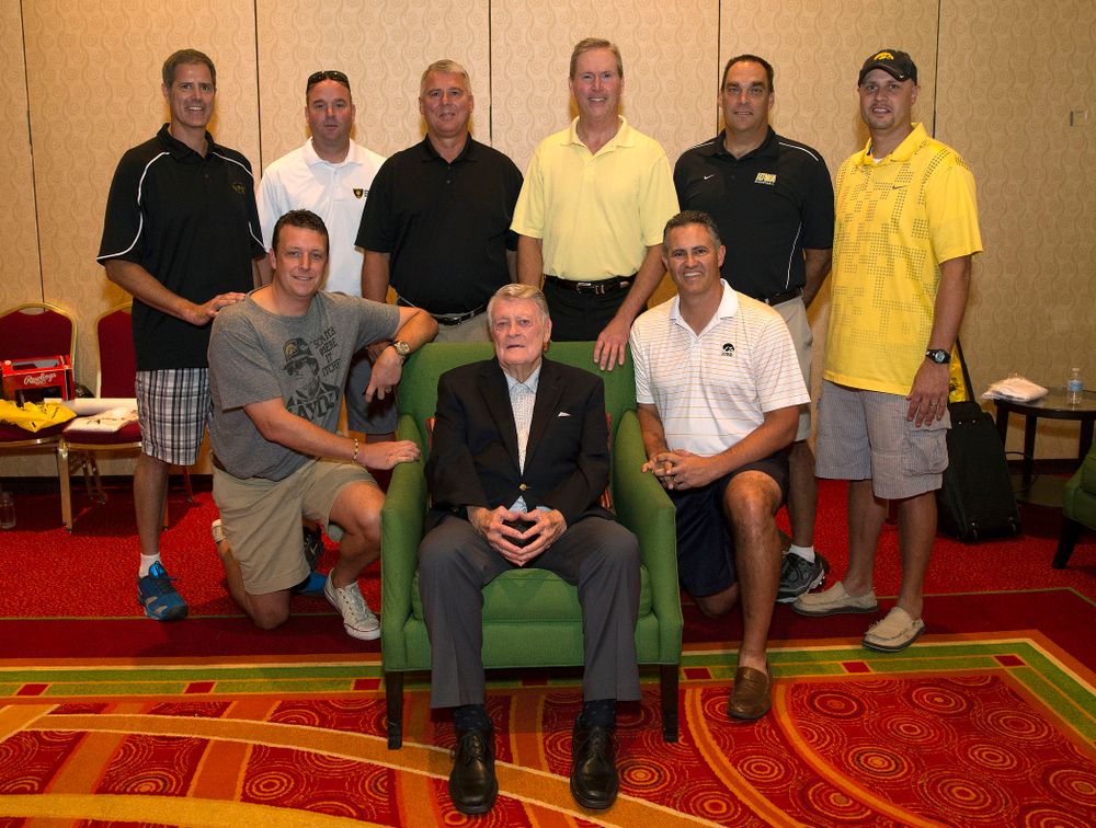 Former Hawkeye Football Head Coach Hayden Fry poses with some of his former quarterbacks before a panel discussion during Fry Fest Friday, Aug. 29, 2014 in Coralville.  (Brian Ray/hawkeyesports.com)