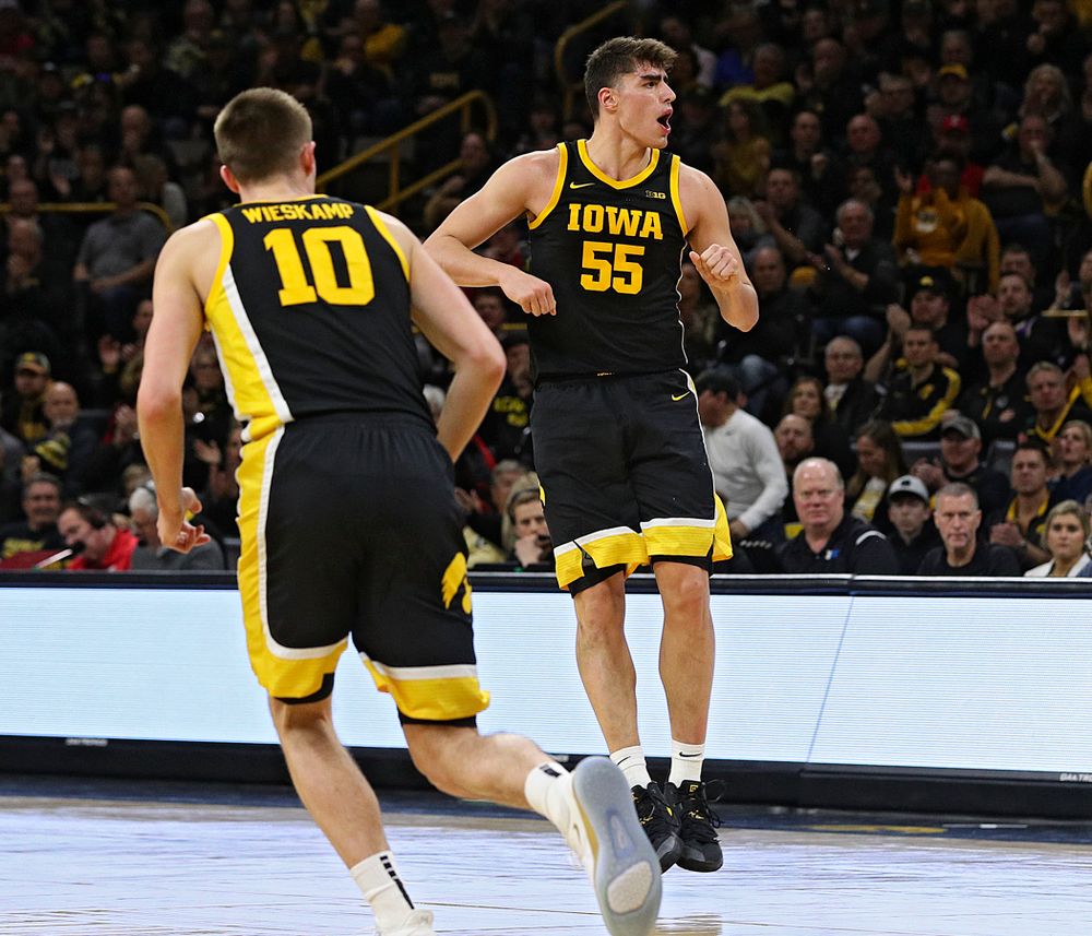 Iowa Hawkeyes center Luka Garza (55) celebrates after making a 3-pointer during the second half of their game at Carver-Hawkeye Arena in Iowa City on Monday, January 27, 2020. (Stephen Mally/hawkeyesports.com)
