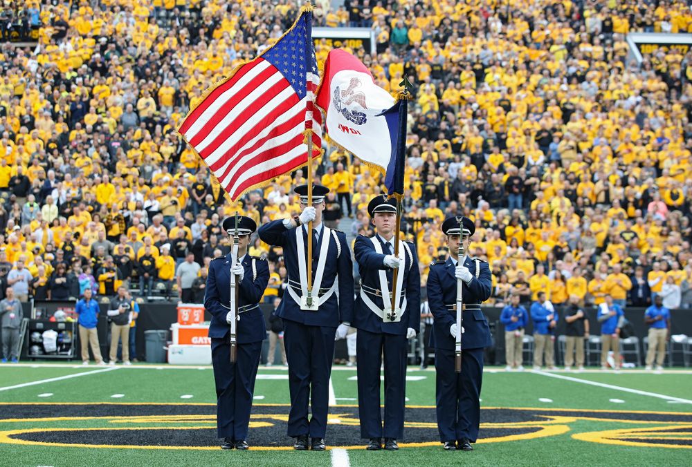 The color guard presents the flags for the National Anthem 
before their game at Kinnick Stadium in Iowa City on Saturday, Sep 28, 2019. (Stephen Mally/hawkeyesports.com)