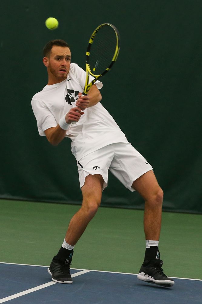 Iowa’s Kareem Allaf hits a forehand during the Iowa men’s tennis match vs Western Michigan on Saturday, January 18, 2020 at the Hawkeye Tennis and Recreation Complex. (Lily Smith/hawkeyesports.com)