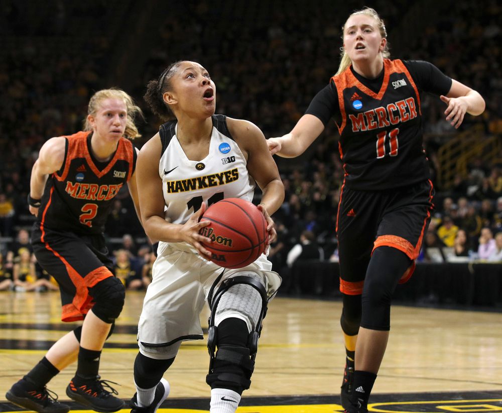 Iowa Hawkeyes guard Tania Davis (11) makes a basket during the first round of the 2019 NCAA Women's Basketball Tournament at Carver Hawkeye Arena in Iowa City on Friday, Mar. 22, 2019. (Stephen Mally for hawkeyesports.com)