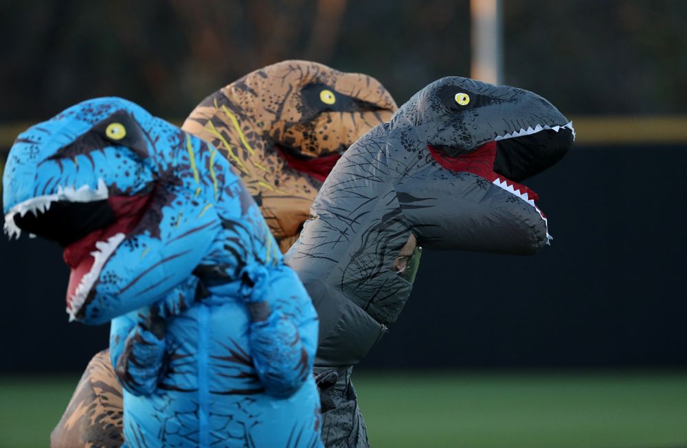 The dinosaur race during the Iowa Hawkeyes game against the Nebraska Cornhuskers on Military Appreciation Night Friday, April 19, 2019 at Duane Banks Field. (Brian Ray/hawkeyesports.com)