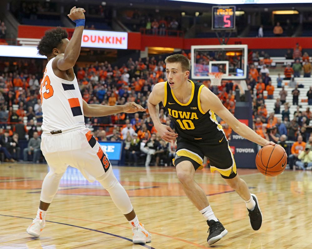Iowa Hawkeyes forward Riley Till (20) is pumped up after winning their ACC/Big Ten Challenge game at the Carrier Dome in Syracuse, N.Y. on Tuesday, Dec 3, 2019. (Stephen Mally/hawkeyesports.com)