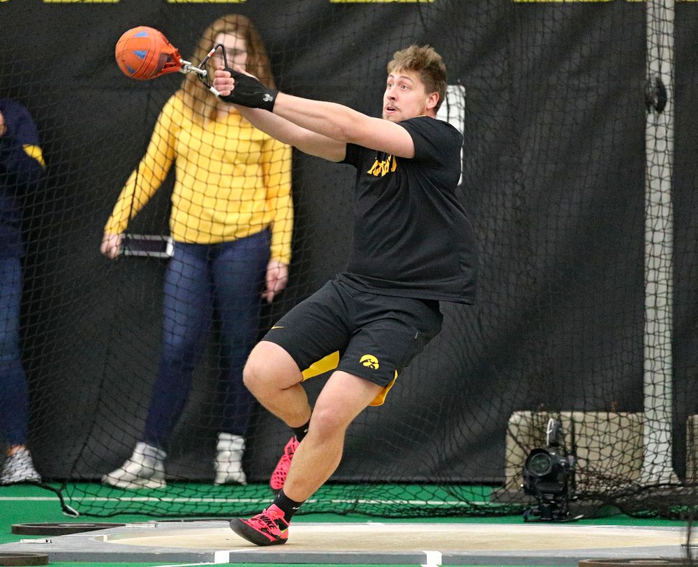 Iowa’s Jordan Hawkins throws during the men’s weight throw event at the Hawkeye Tennis and Recreation Complex in Iowa City on Friday, January 31, 2020. (Stephen Mally/hawkeyesports.com)