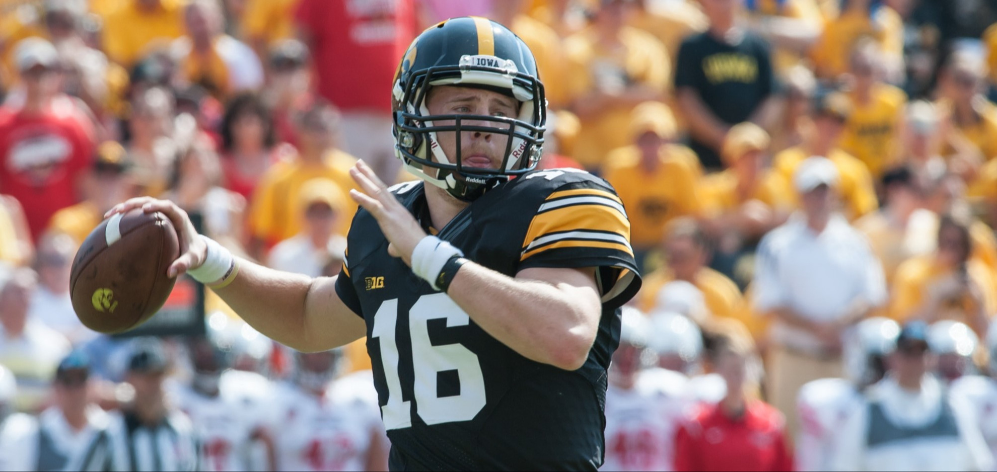 C.J. Beathard throws the football in a home game.