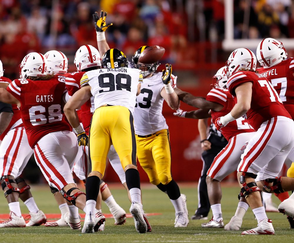 Iowa Hawkeyes defensive end Anthony Nelson (98) and linebacker Josey Jewell (43) 