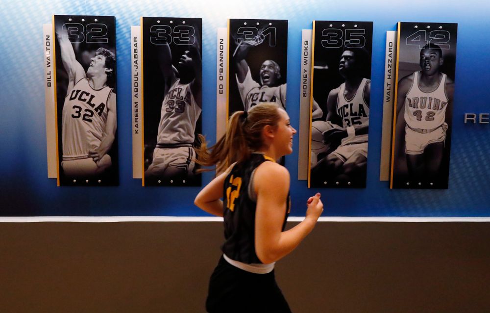 The Iowa Hawkeyes warmup before practice Friday, March 16, 2018 in the hallways of Pauley Pavilion on the campus of UCLA. (Brian Ray/hawkeyesports.com)