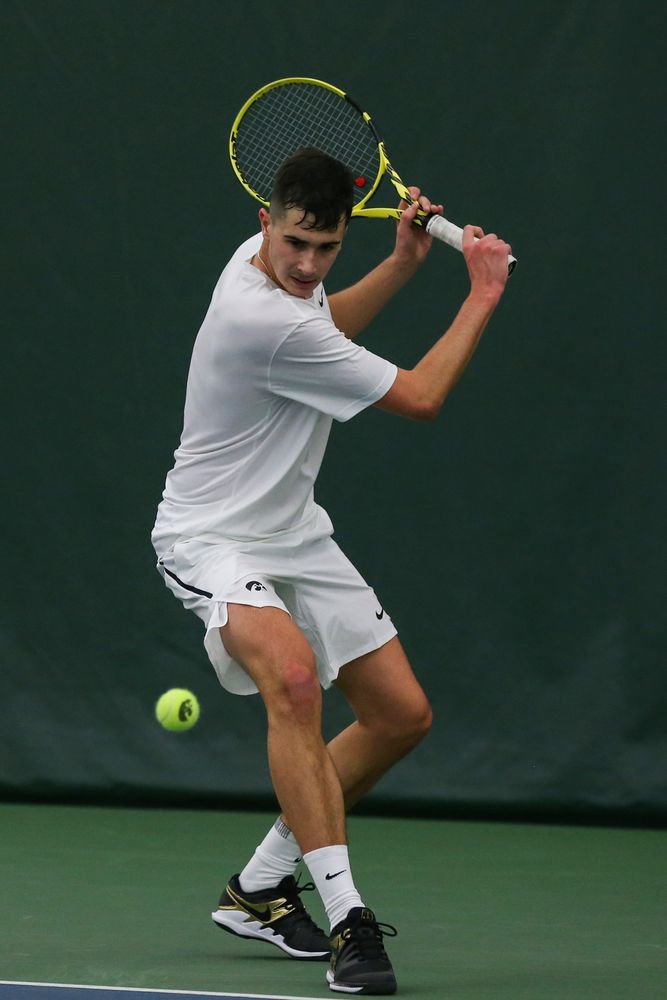 Iowa’s Matt Clegg prepares to hit a backhand during the Iowa men’s tennis match vs Western Michigan on Saturday, January 18, 2020 at the Hawkeye Tennis and Recreation Complex. (Lily Smith/hawkeyesports.com)