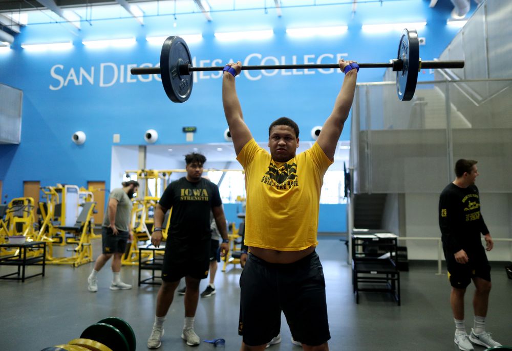 Iowa Hawkeyes offensive lineman Alaric Jackson (77) lifts before practice Sunday, December 22, 2019 at Mesa College in San Diego. (Brian Ray/hawkeyesports.com)