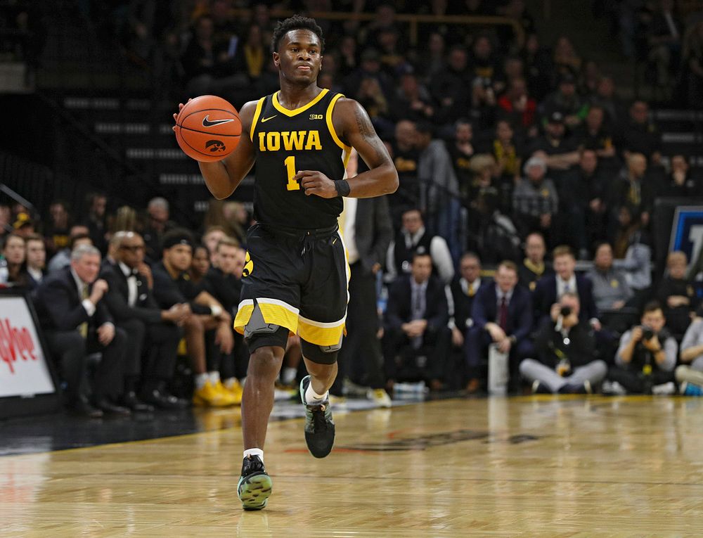 Iowa Hawkeyes guard Joe Toussaint (1) brings the ball down the court during the first half of their game at Carver-Hawkeye Arena in Iowa City on Monday, January 27, 2020. (Stephen Mally/hawkeyesports.com)