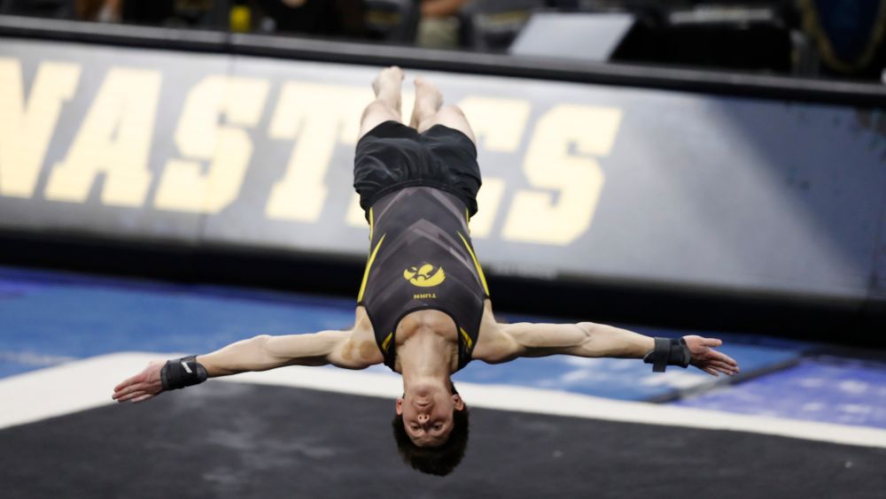 Iowa's Mark Springett competes on the floor 