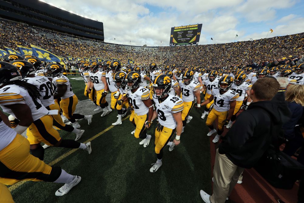 The Iowa Hawkeyes swarm on to the field for their game against the Michigan Wolverines Saturday, October 5, 2019 at Michigan Stadium in Ann Arbor, MI. (Brian Ray/hawkeyesports.com)