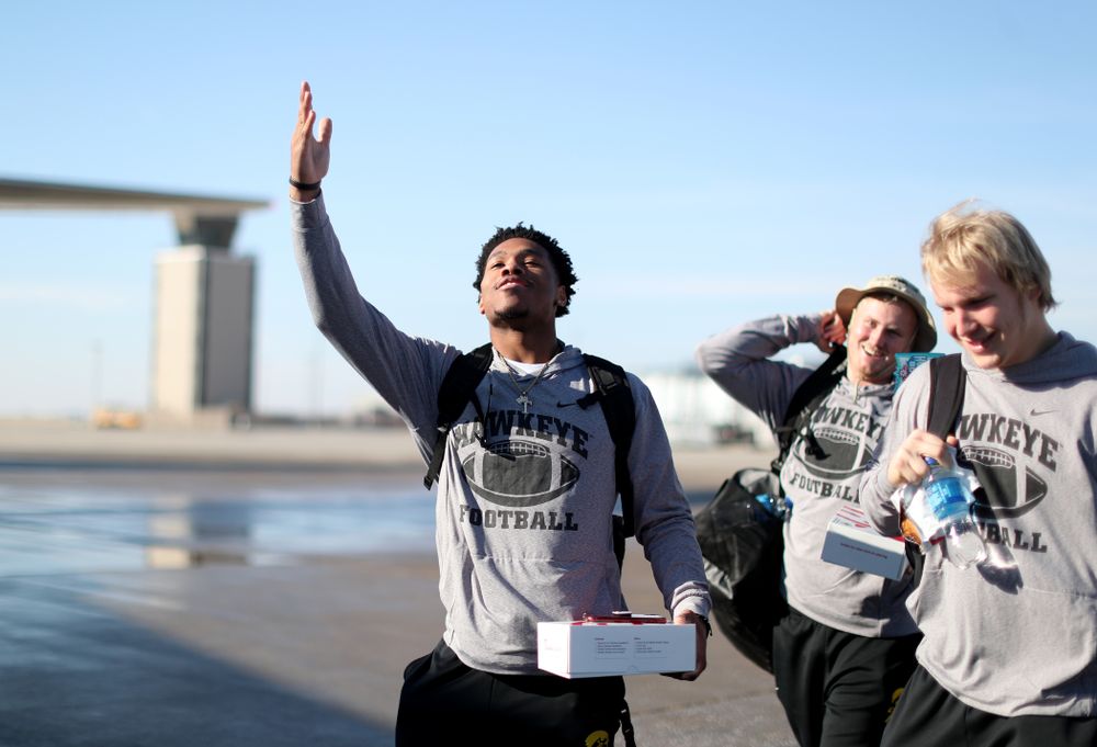 Iowa Hawkeyes wide receiver Tyrone Tracy Jr. (3) boards the team plane at the Eastern Iowa Airport Saturday, December 21, 2019 on the way to San Diego, CA for the Holiday Bowl. (Brian Ray/hawkeyesports.com)