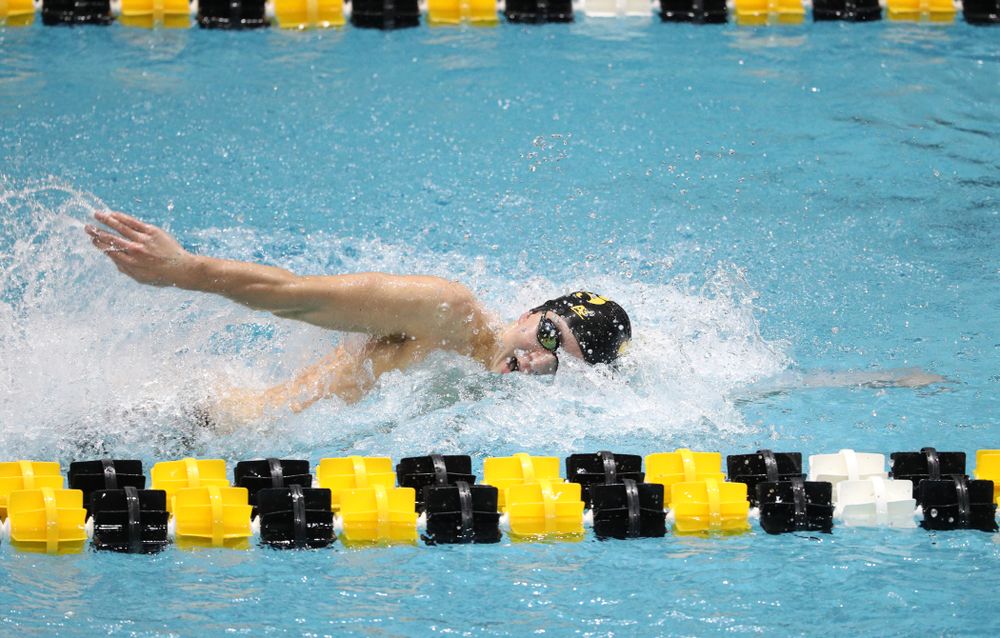 Iowa's Michael Tenney swims the third leg of the 800 freestyle relay at the 2019 Big Ten Swimming and Diving meet  Wednesday, February 27, 2019 at the Campus Wellness and Recreation Center. (Brian Ray/hawkeyesports.com)