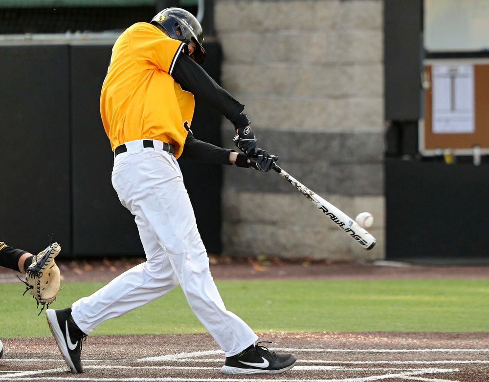 Iowa outfielder Connor McCaffery (30) hits a 2-run double during the fourth inning of the first game of the Black and Gold Fall World Series at Duane Banks Field in Iowa City on Tuesday, Oct 15, 2019. (Stephen Mally/hawkeyesports.com)