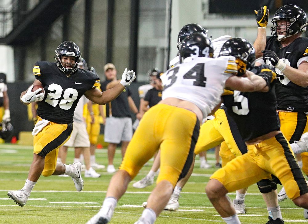 Iowa Hawkeyes running back Toren Young (28) on a run during Fall Camp Practice No. 6 at the Hansen Football Performance Center in Iowa City on Thursday, Aug 8, 2019. (Stephen Mally/hawkeyesports.com)