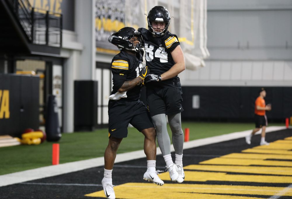 Iowa Hawkeyes running back Mekhi Sargent (10) and wide receiver Nick Easley (84) during preparation for the 2019 Outback Bowl Tuesday, December 18, 2018 at the Hansen Football Performance Center. (Brian Ray/hawkeyesports.com)