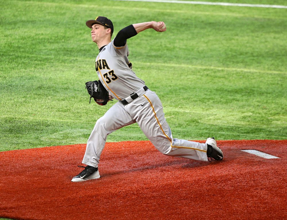 Iowa Hawkeyes pitcher Jack Dreyer (33) delivers to the plate during the first inning of their CambriaCollegeClassic game at U.S. Bank Stadium in Minneapolis, Minn. on Friday, February 28, 2020. (Stephen Mally/hawkeyesports.com)