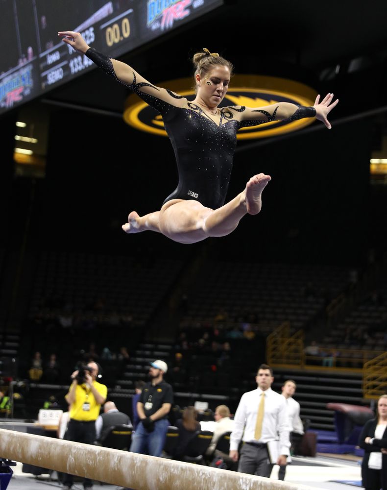 Iowa's Emma Hartzler competes on the beam during their meet against Southeast Missouri State Friday, January 11, 2019 at Carver-Hawkeye Arena. (Brian Ray/hawkeyesports.com)